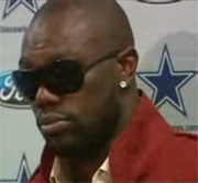 Terrell Owens crying during press conference, defending Romo